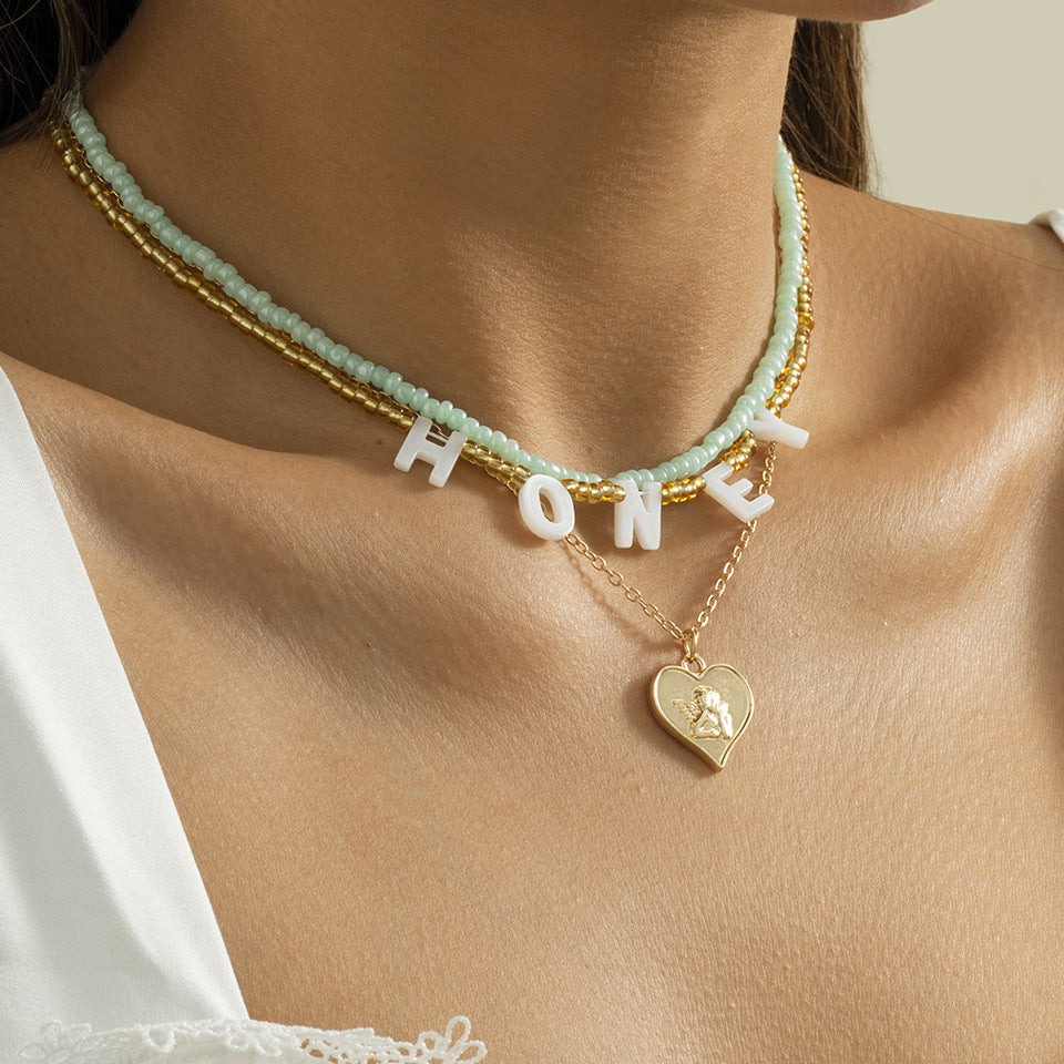 Honey Letter Necklace Stacked Portrait Beaded Heart By Planderful Vienna Verve For Women Chic Statement Jewelry