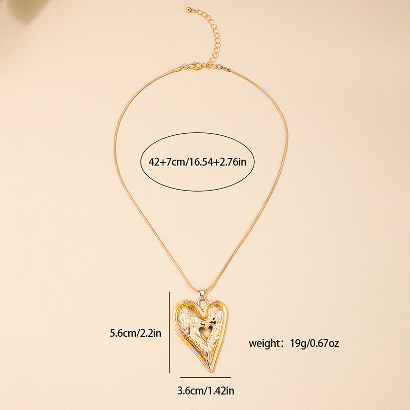 Exaggerated Love Symbol Sweater Chain Necklace with Hollow Pendant