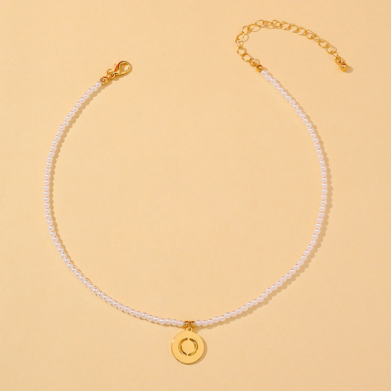 Elegant Hollow English Letter Pendant Necklace with Pearl Accents