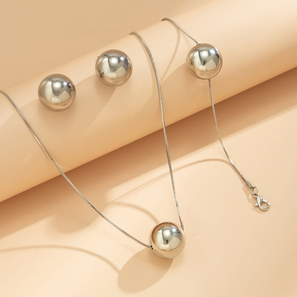 European and American Inspired Statement Necklace with Punk Snake Bone Chain and Geometric Ball Accent