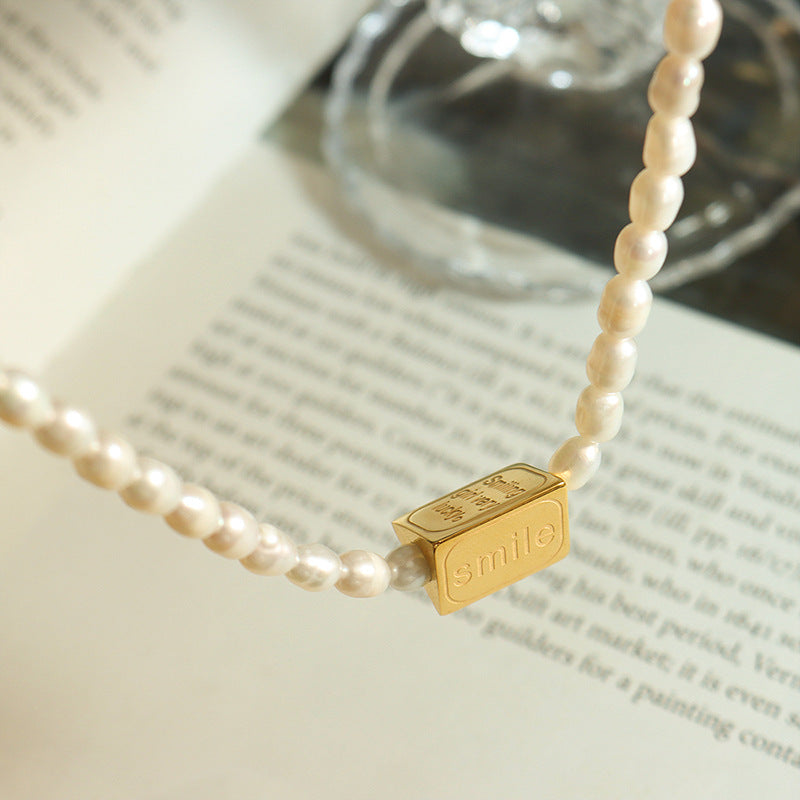 European American Triangle Carved Smiling Face Necklace - Titanium Steel & Freshwater Pearl