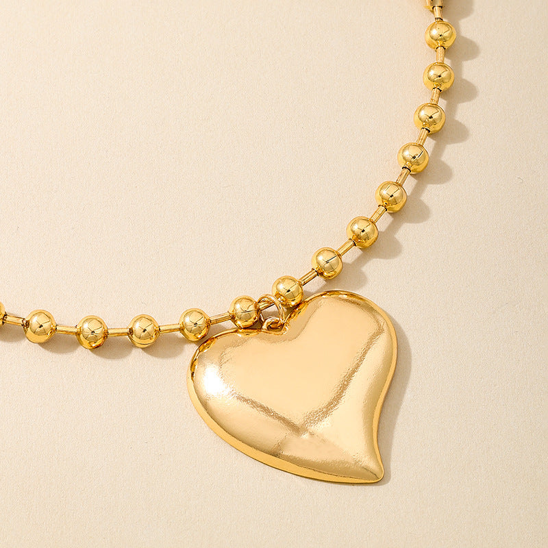 Planderful Vienna Verve Necklace – Stylish Retro Gold Round Bead Design