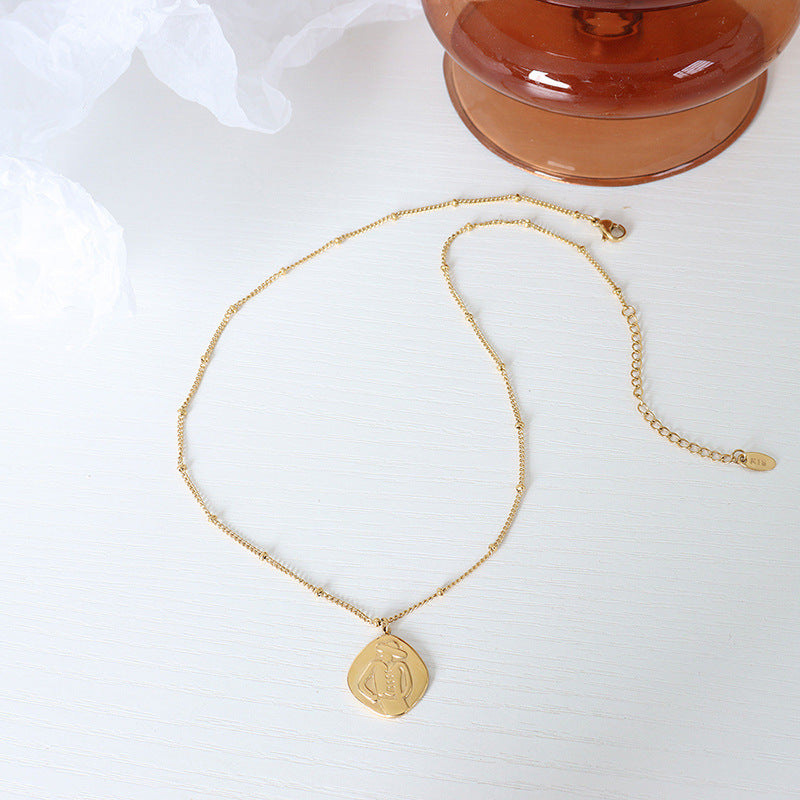 Golden Embossed Portrait Pendant Necklace - Stylish Titanium Steel Chain