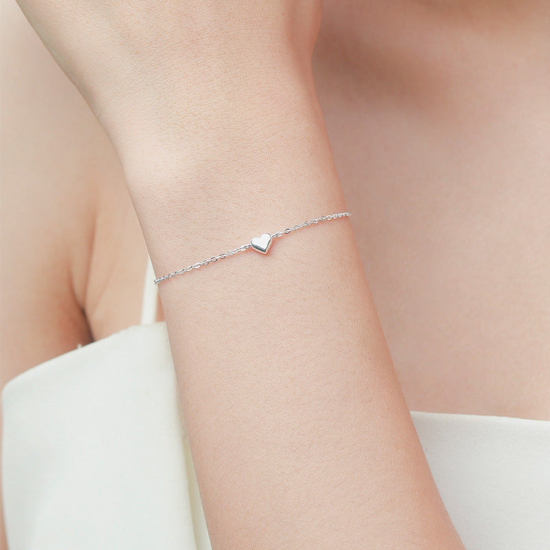 Sterling Silver Love Girl Bracelet - Elegant and Versatile Cross Chain Jewelry