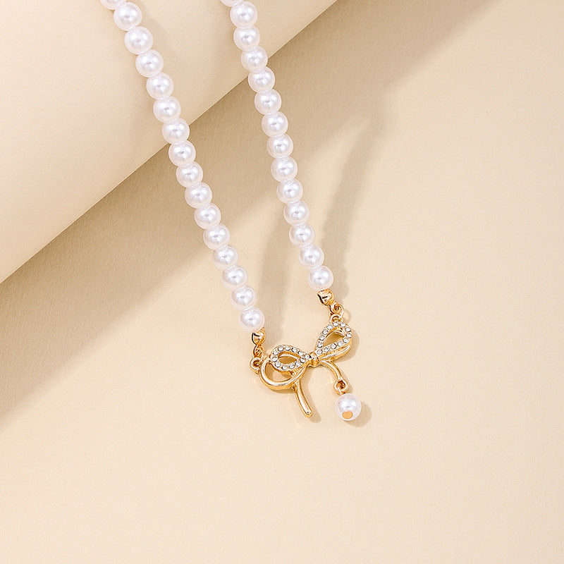 Stylish Bow Pearl Necklace with Hip-Hop Pendant