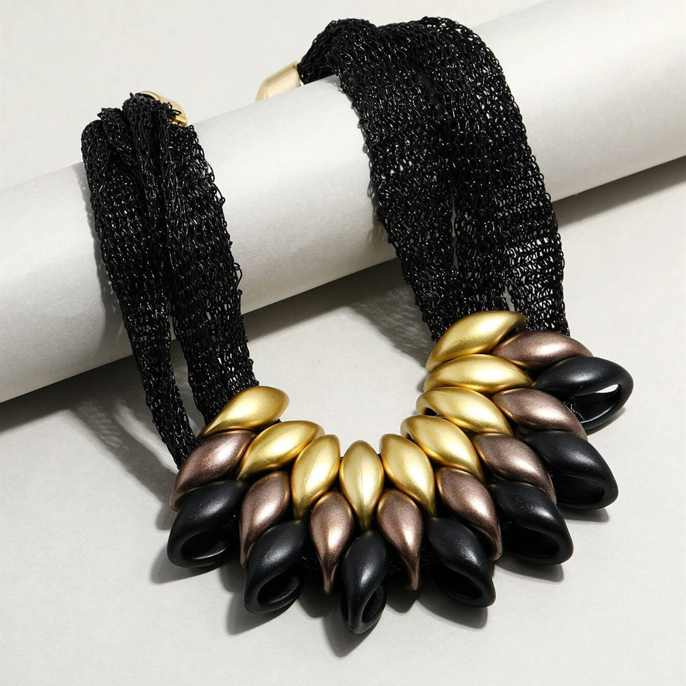 Planderful Savanna Rhythms Necklace – Exaggerated Gold Acrylic Design