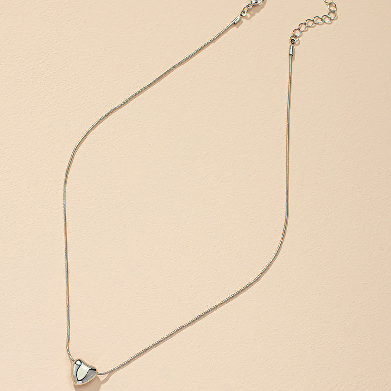 Exquisite Vienna Verve Heart Chain Necklace - Metal Jewelry Piece from Planderful Collection