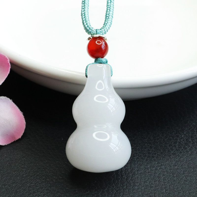 Golden Silk Jade Gourd Pendant