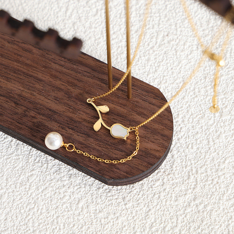 Elegant Seashell Rose Necklace with Baroque Pearl Pendant