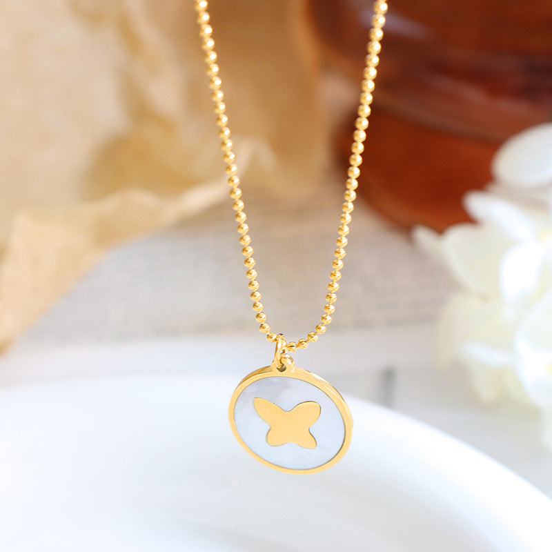 Enchanting Titanium Starfish and Butterfly Necklace with Sea Shell Pendant