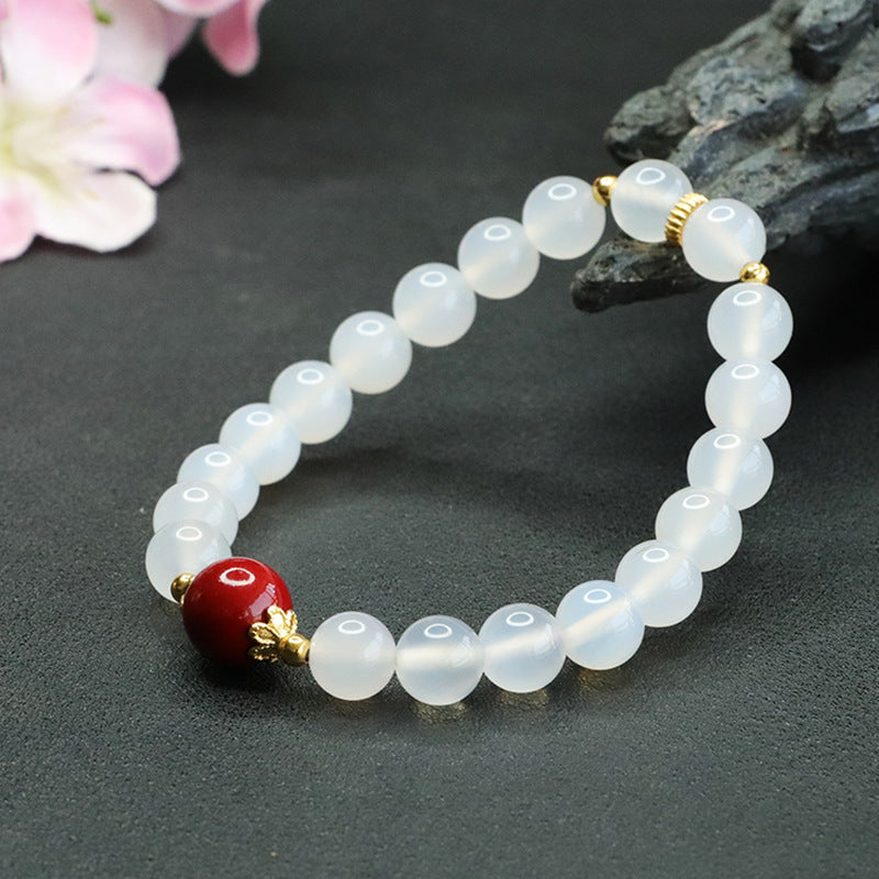 Fortune's Favor Sterling Silver Bracelet with Cinnabar Bead and Natural White Chalcedony