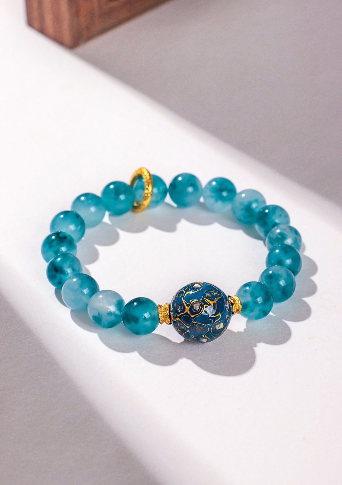10 mm Blue Chalcedony Lacquer Bead Bracelet