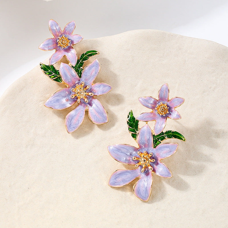 Planderful Vienna Verve Earrings – Fashionable Metal Color Dripping Flower Design
