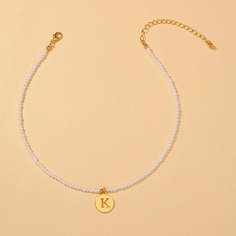 Elegant Hollow English Letter Pendant Necklace with Pearl Accents