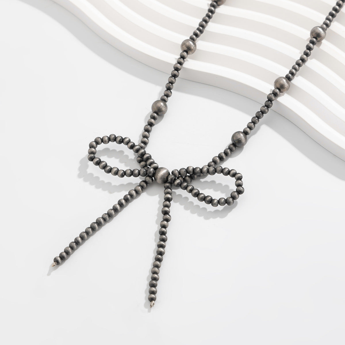 Planderful Vienna Verve Necklace – Handmade Ethnic Turquoise Bow Design