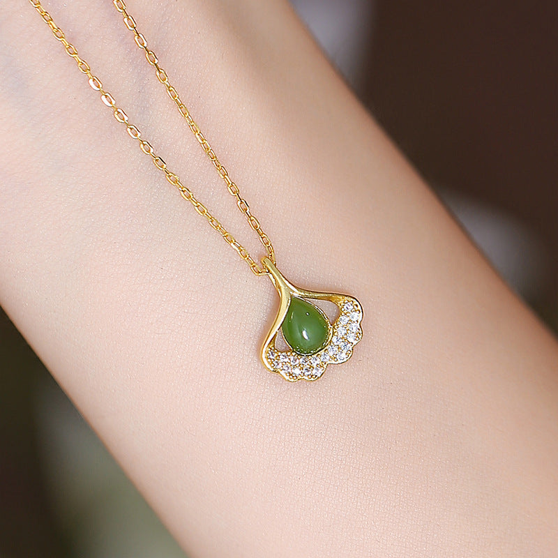 Luxurious Ginkgo Leaf Pendant Necklace with Hotan Jade and S925 Silver Chain