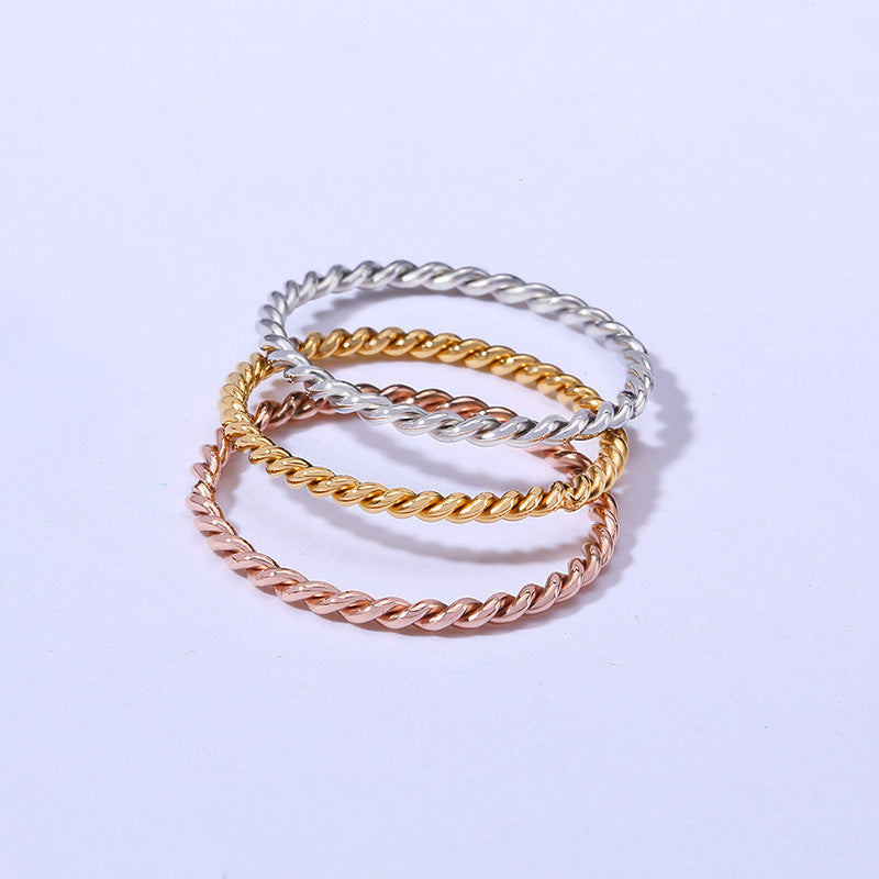 Jewelry 18K Gold Japan and Korea Titanium Steel Twisted Ring