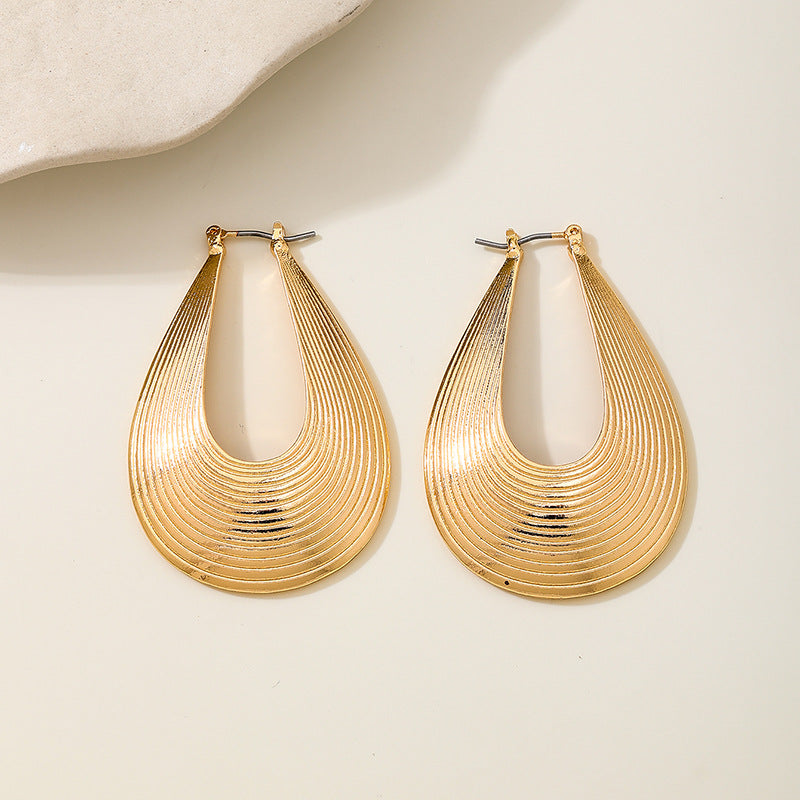 Planderful Vienna Verve Earrings – Exaggerated Metal Hollow Water Drop Design