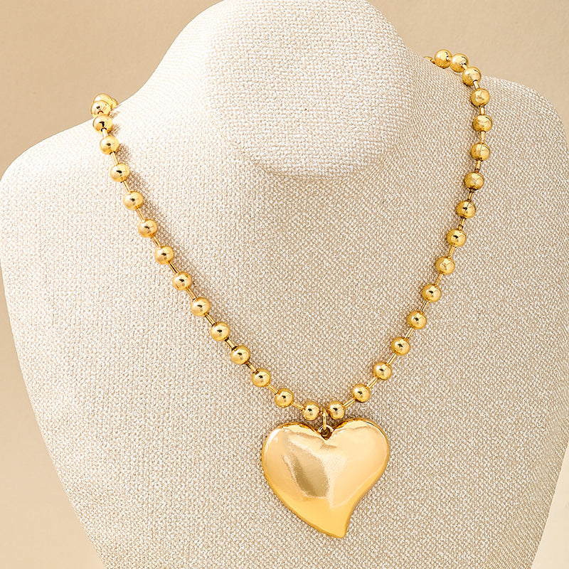 Planderful Vienna Verve Necklace – Stylish Retro Gold Round Bead Design