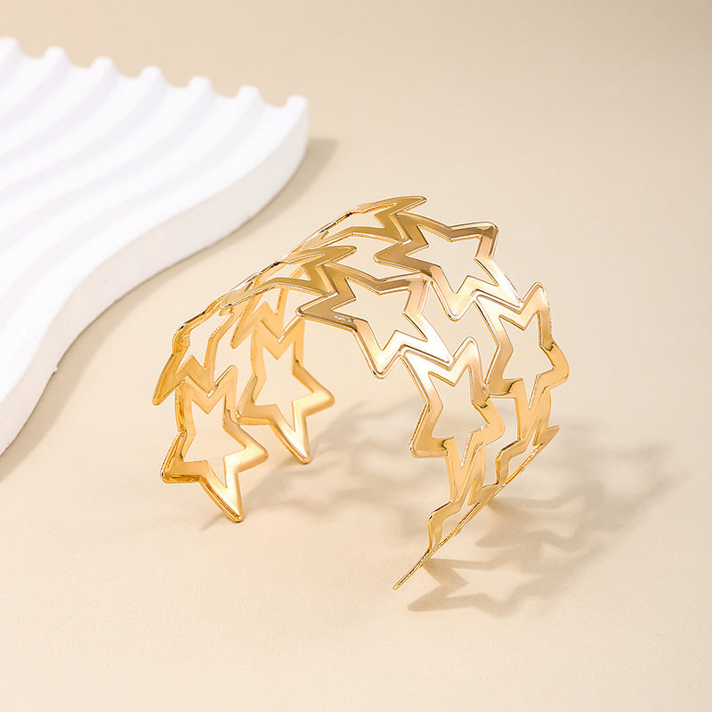 Exaggerated Wide-Face Hollow Star Bracelet in Metal - Vienna Verve Collection