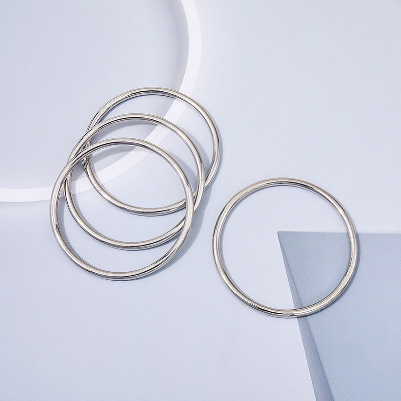 Cross-border Elegance: Vienna Verve Metal Coil Bracelet Set