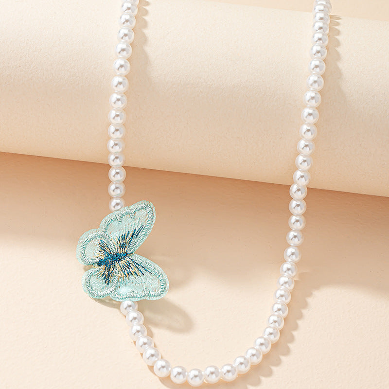 Butterfly Embroidered Neckpiece with Niche Design