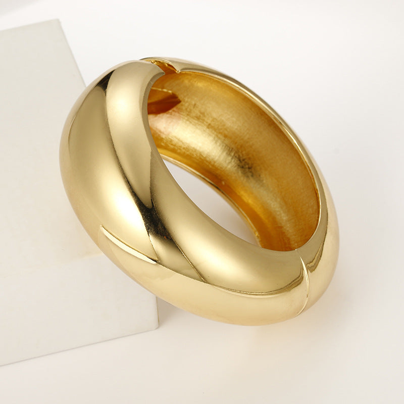 Extravagant Gold-Tone Asymmetric Bracelet with European Flair