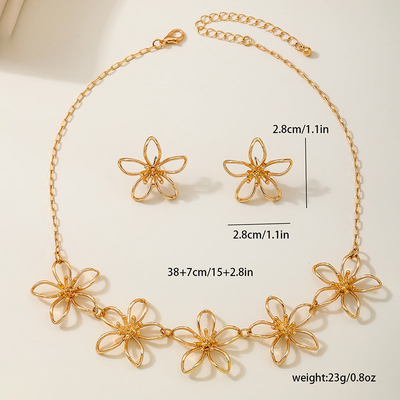 Elegant Women's Metal Lines Flower Jewelry Set by Planderful
