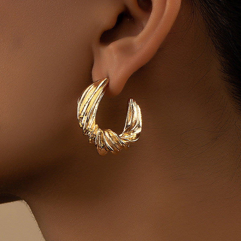 Chic Vienna Verve Metal Earrings with Unique Design