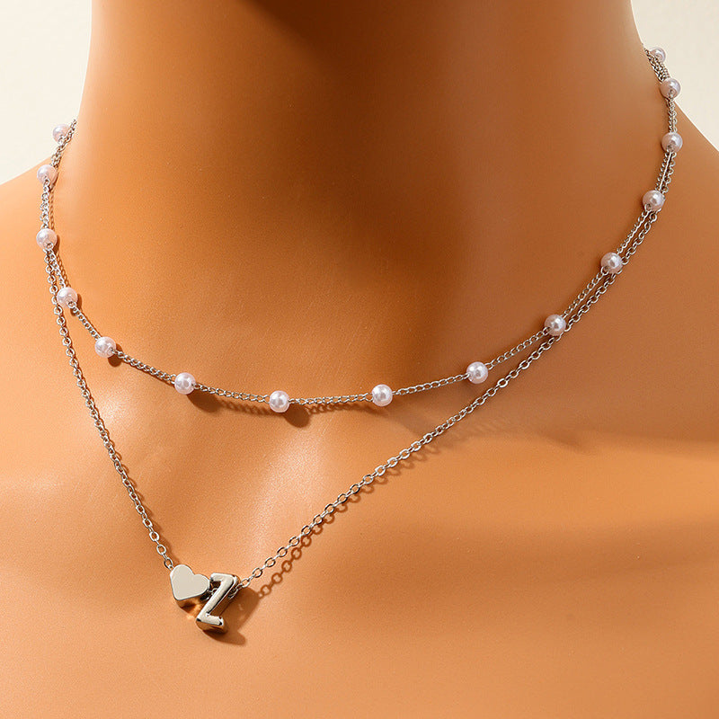 Elegant Pearl Collar Necklace with Metal Love Pendant