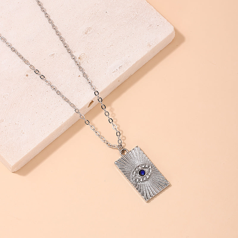 Retro Blue Diamond Pendant Necklace with a Tempting Devil's Eye Sparkle