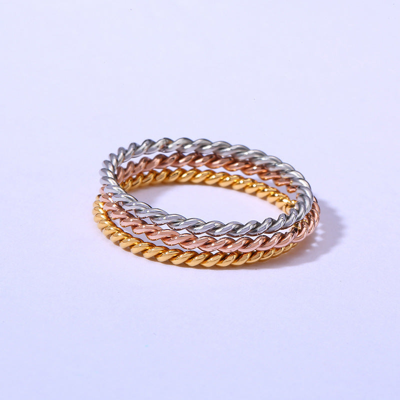 Jewelry 18K Gold Japan and Korea Titanium Steel Twisted Ring