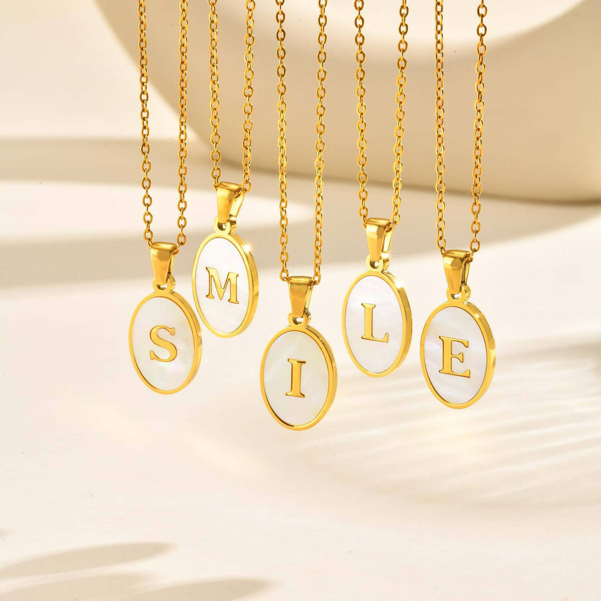Gold Oval Initial Letter Pendant — A–Z