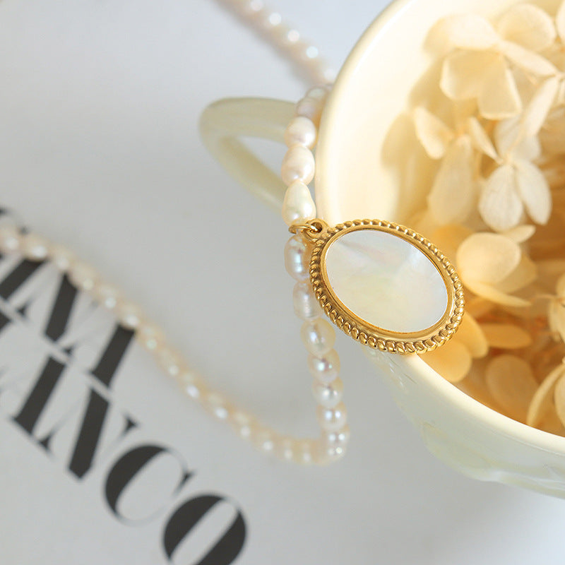 Elegant French Pearl Necklace with Sea Shell Pendant