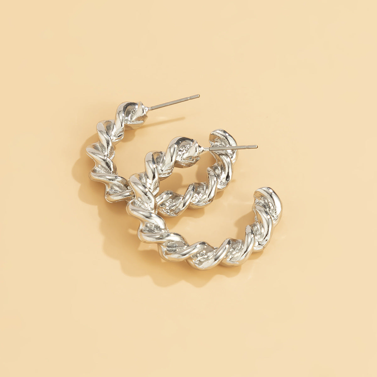 Elegant C-Shaped Metal Earrings with Thread Accent