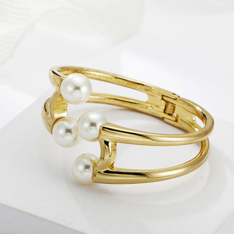 Mystique Pearl Bracelet - Exquisite Metal Bangle with Edgy Charm