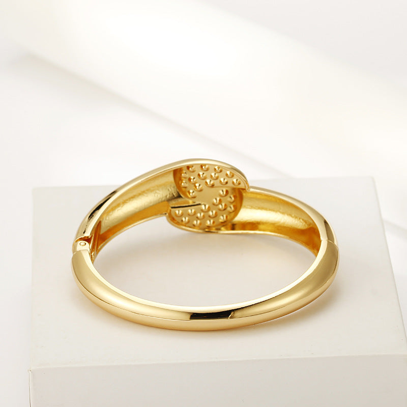 Glossy Gold Bracelet from Vienna Verve Collection