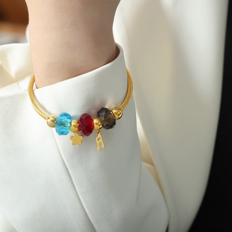 Luxurious Handcrafted Titanium Steel Gold-Plated Bracelet with Natural Stone Embellishments