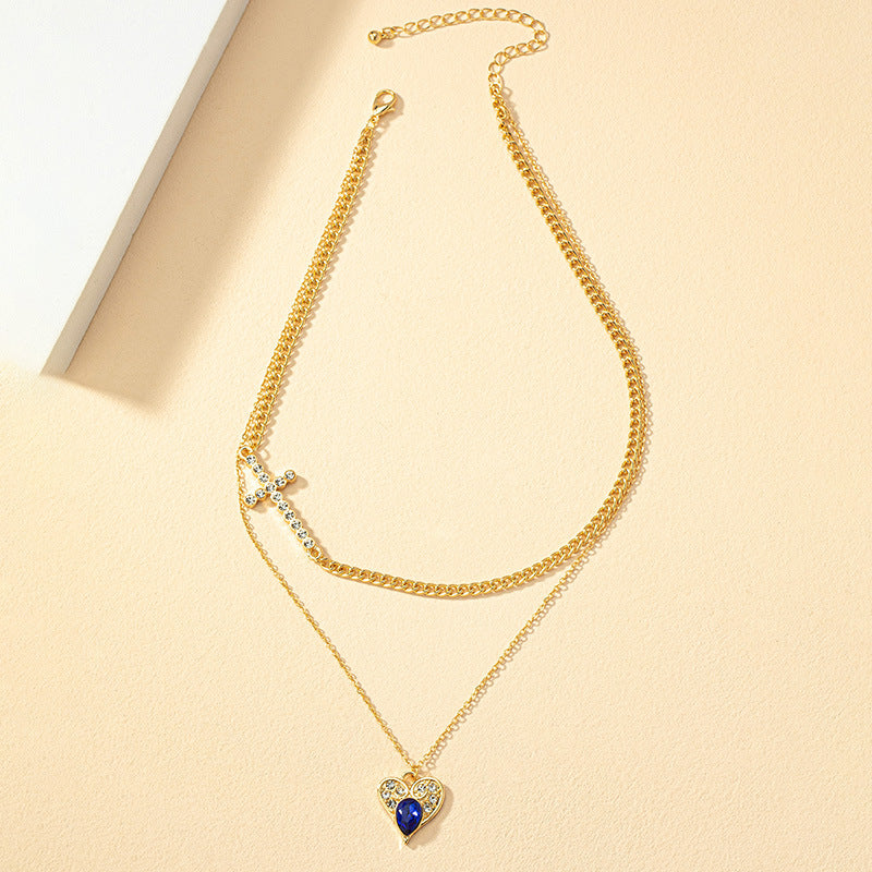 Elegant Double Strand Necklace with Cross Pendant