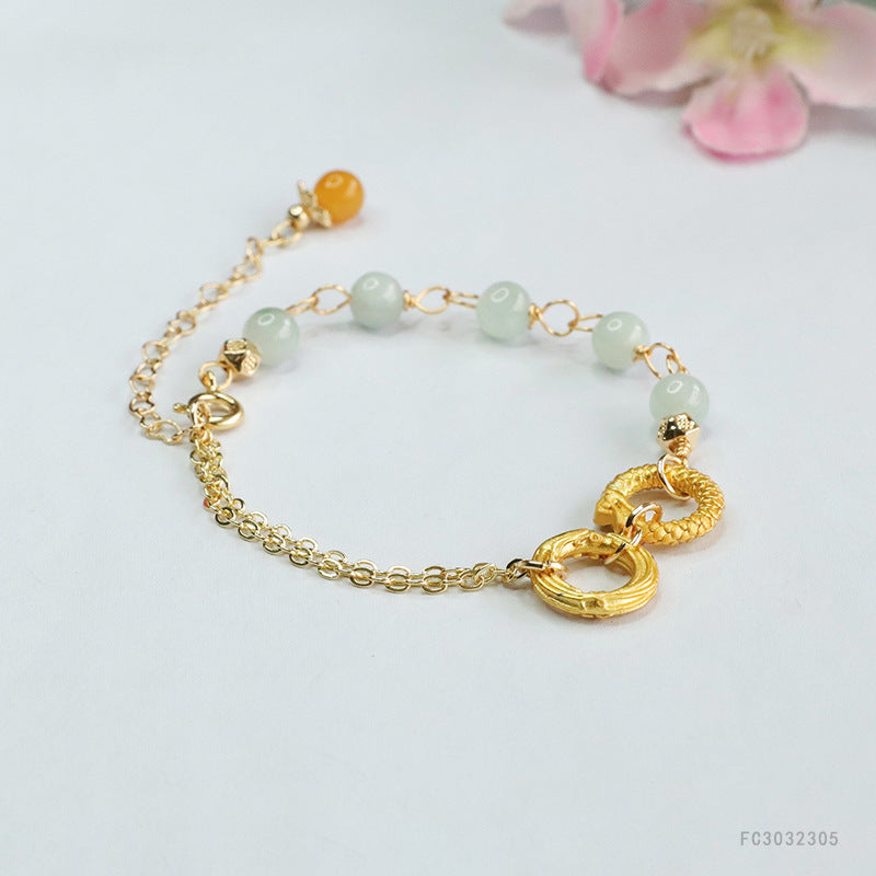 Jadeite Dragon & Phoenix Round Bead Bracelet