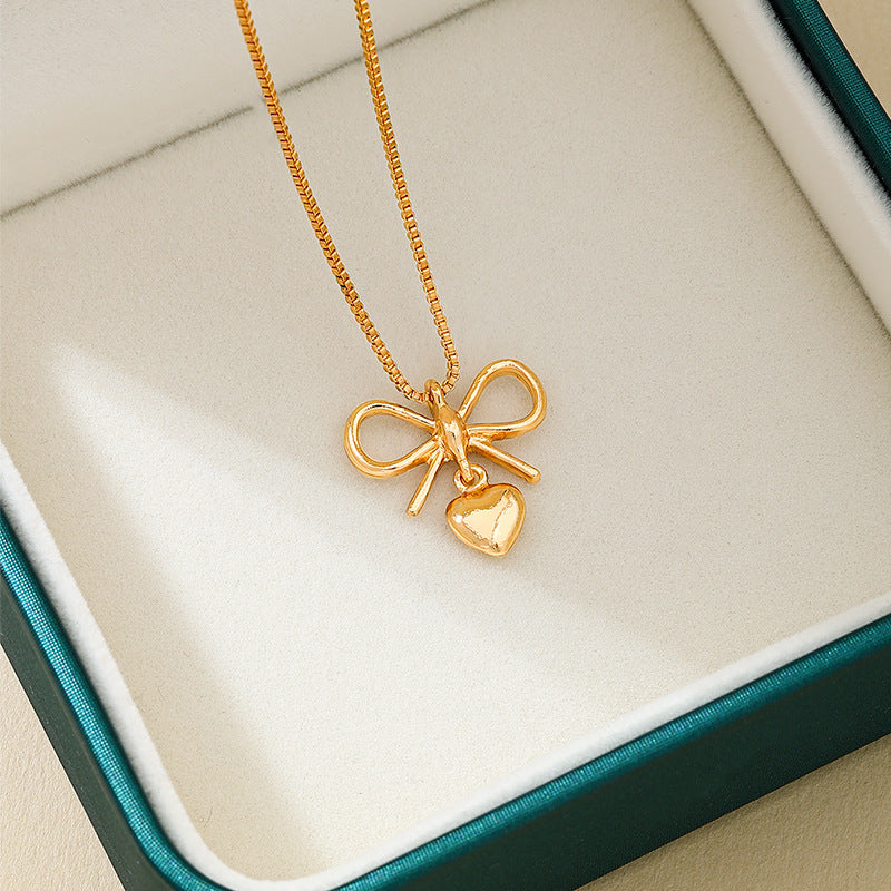 Planderful Vienna Verve Necklace – Elegant Metal Bow Design