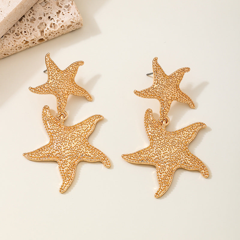 Planderful Vienna Verve Earrings – Exaggerated Fringed Design with Marine Element