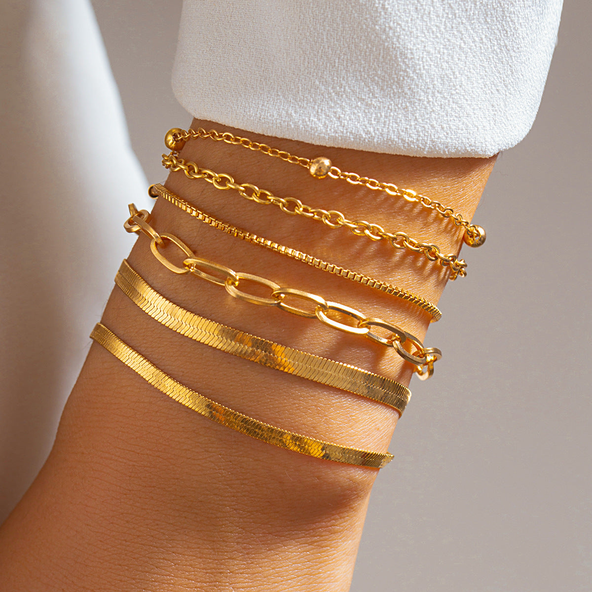 European and American Metal Layered Chain Bracelet with Snake Bone Detail