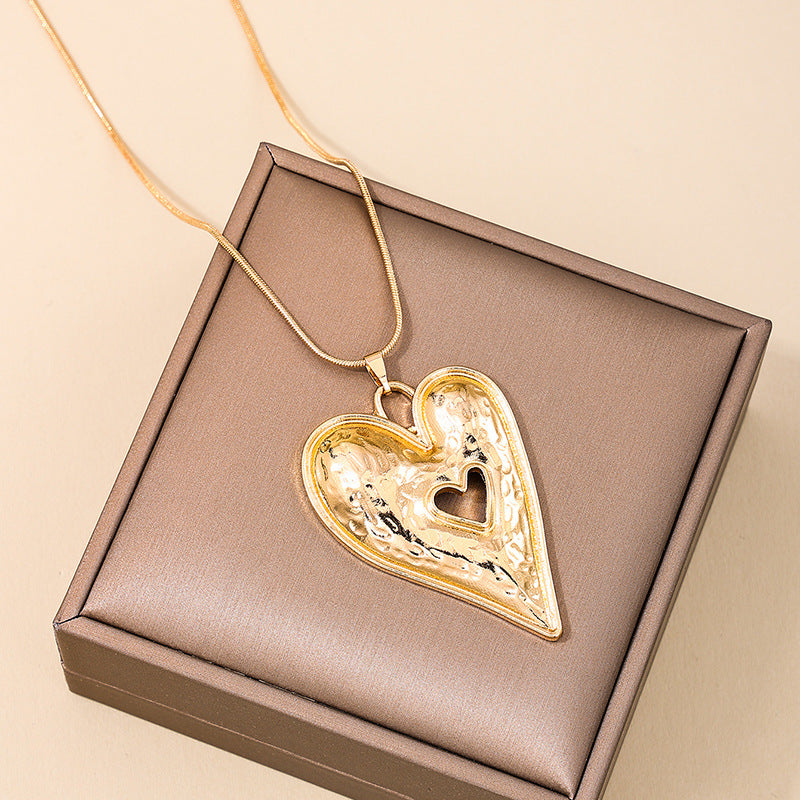 Exaggerated Love Symbol Sweater Chain Necklace with Hollow Pendant