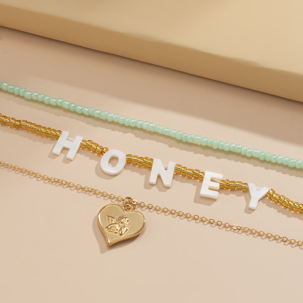 Honey Letter Necklace Stacked Portrait Beaded Heart By Planderful Vienna Verve For Women Chic Statement Jewelry