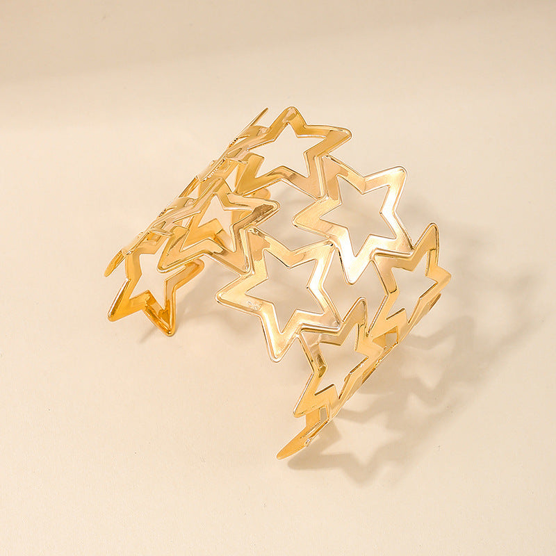 Exaggerated Wide-Face Hollow Star Bracelet in Metal - Vienna Verve Collection
