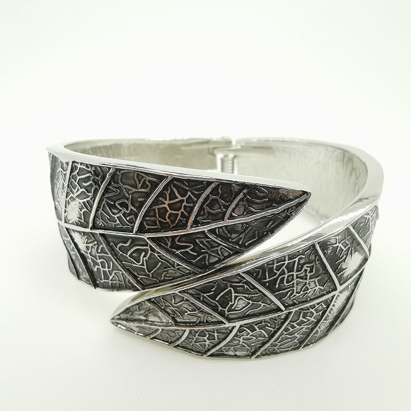 Enchanting Vienna Verve Metal Bracelet with Intricate Leaf Design