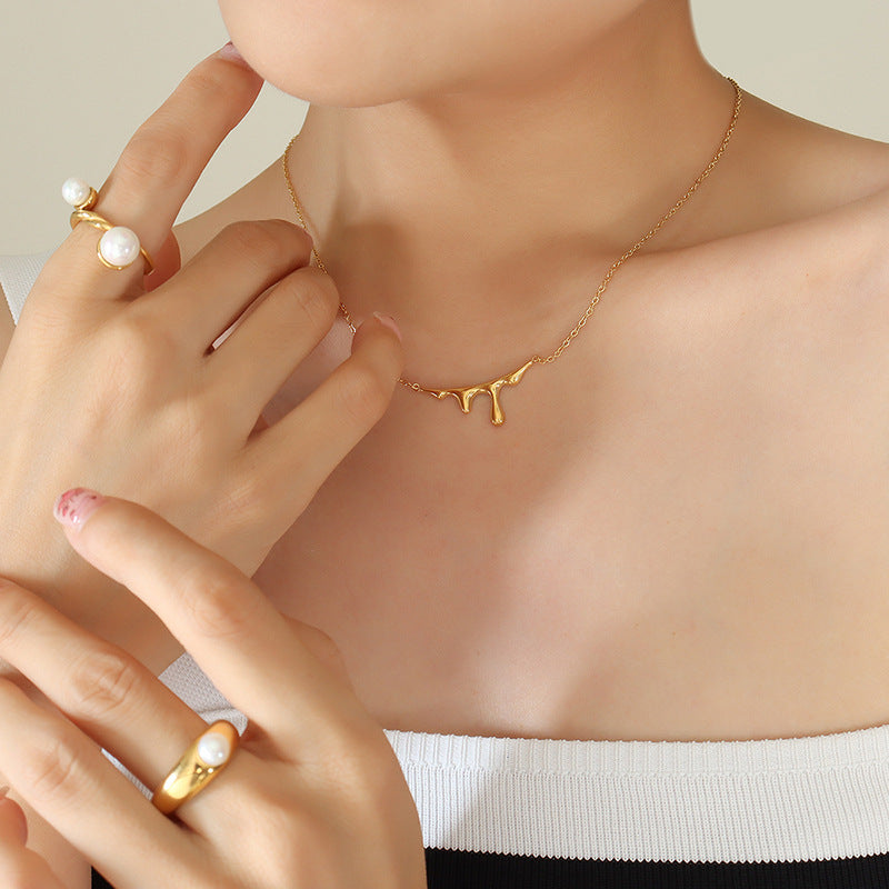 Luxurious 18K Gold Plated Water Drop Pendant Necklace with Lava Light Design