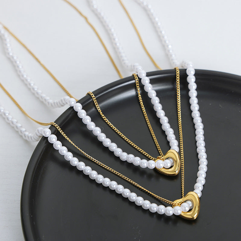 Elegant Handcrafted Pearl Necklace with Retro Charm and Gold Plating