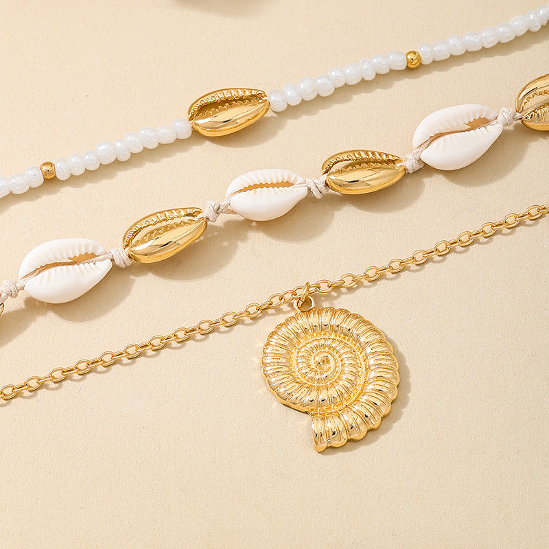 Planderful Vienna Verve Necklace – Beachy Chic Metal Conch Shell Design
